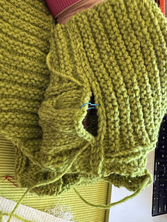 I seamed from the outside edges in.  I wish I had thought to do the "decrease the cable" on the next to last rows.  I was able to get it to look good, but that "contract the cable flare" trick would have made it even easier.