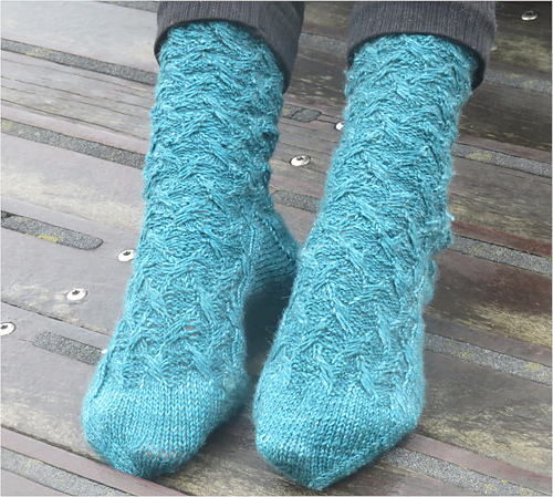 Ravelry: Impossible Geometry Socks pattern by Sarah Dawn