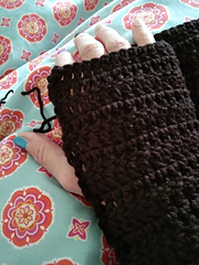 Not a great photo, but shows which way the rows go in my version -- which is the opposite way to the pattern photo shows.