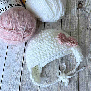 Easy baby hat with bow and ear flaps crochet pattern