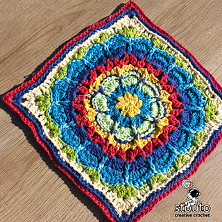 Fiorone crochet flower granny square with dimensional floral centre and textured petals