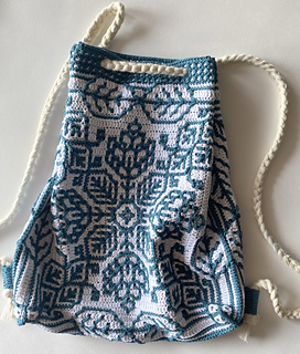 I turned two Filigree motifs into a little backpack