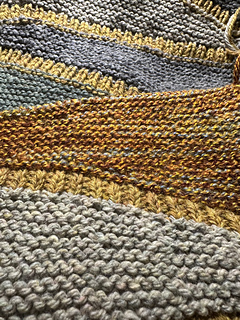 Three strands of this fine yarn to match the weight of the other yarn. Love the result.