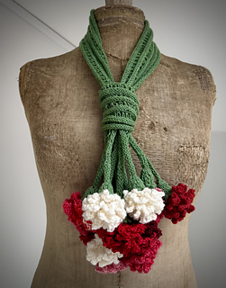Another way to wear the scarf, using a simplified version of a formal suit tie.
