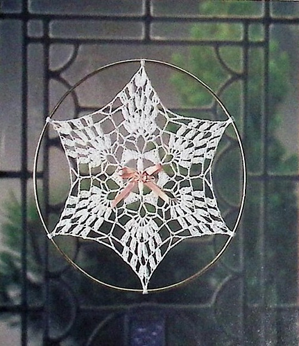 Ravelry: Pineapple Snowflake Sun Catcher pattern by Maggie Weldon