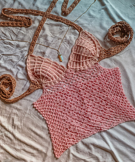 This is Serena, designed with realistic crocheted sea shells for the bust and a mix of mesh net-like and shell lace stitches.