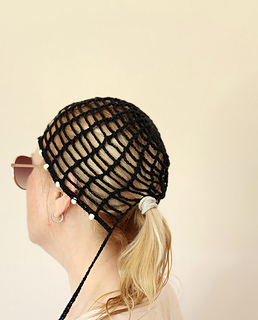Adjustable crochet hat pattern, demonstrating the custom fit feature for a ponytail.