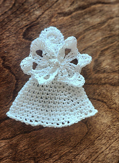Finished Healing Angel crochet pattern in a soft, cozy setting, symbolizing support for  illness