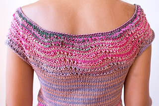 Simple lacework at the top and bottom of the shirt add a little visual interest to the design.