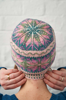 Learn to catch in floats while knitting this stunning hat by Janette Budge.