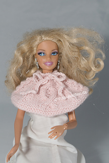 Susie cape with a huge cable on front