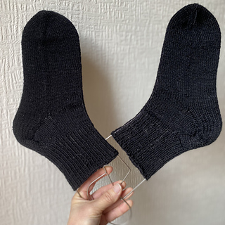 Ravelry: WithLoveFromLN1's Two at a Time Black Socks