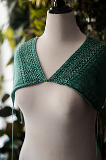 Once both shoulders are complete, the front is joined and worked flat to the underarm.