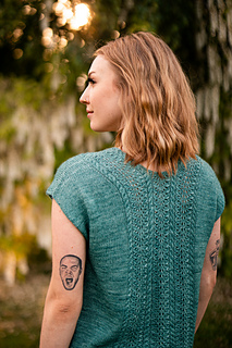sample is shown in size 42” with 9” of positive ease