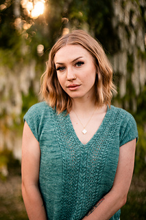 sample is shown in size 42” with 9” of positive ease