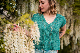 sample is shown in size 42” with 9” of positive ease