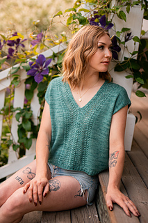 sample is shown in size 42” with 9” of positive ease