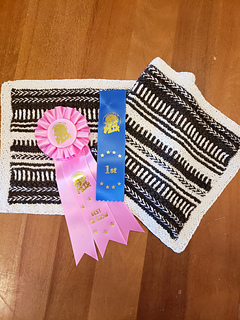 Received a first place ribbon and a Best in Section rosette in a handknit, handspun category at the 2025 Chilliwack Fair.
