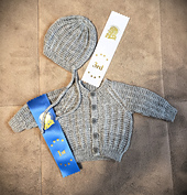 Received a first place ribbon in the handknit baby sweater class at the 2025 Chilliwack Fair. The hat I designed to go with the cardigan received a 3rd place in the handknit hat class.