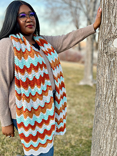 Shown in Harmony Fingering in Granite (A), Cinnamon (B), Paprika
(C), and Mist (D)