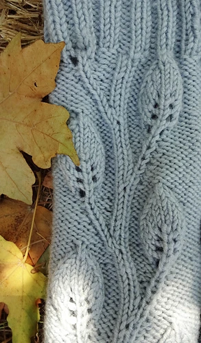 Twining leaf pattern on front and back of leg. 