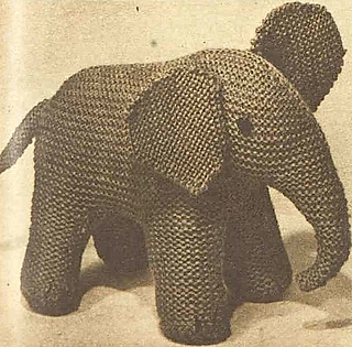 GREY wool has been used for this elephant, but children would be equally delighted if you made it in a bright color. Small buttons make the eyes.