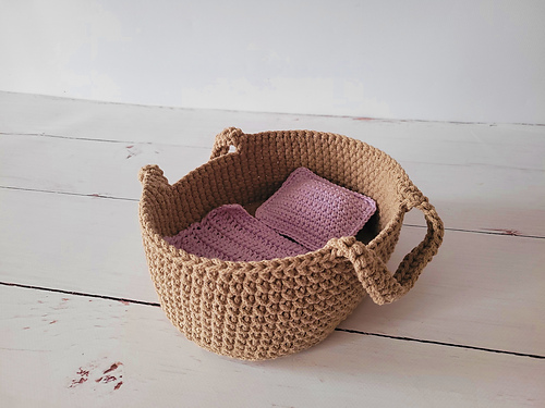 Basket with bedding for a doll