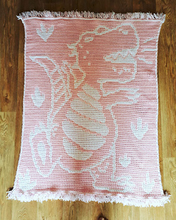 Crocheted by Emily. Fringe detail added to top and bottom.