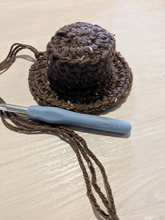 frogged brown hat