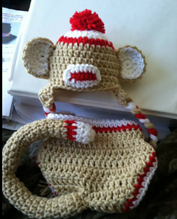 Can you see the resemblance of sock monkey to giraffe pattern? A little color changes, and you are on your way. Try to grab this monkey by the tail....it has a little stuffing in it.