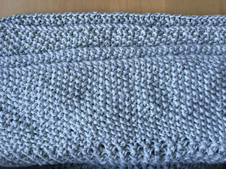 (From bottom to top):
Cable cast-on RS, 
Cable cast-on WS,
Cable bind-off WS,
Cable bind-off RS.

As you can see, the back of the cable bind off looks better than the front, so I bind off on the wrong side, so the front of my blanket will look better. I also did the bind off as knit stitches and not bothered to bind off in pattern.