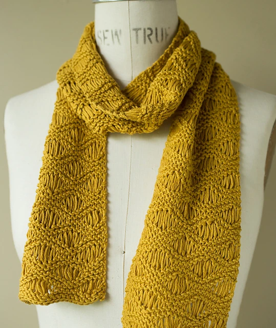 Seafoam Scarf and Wrap drop stitch knitting pattern using cotton blend yarn.