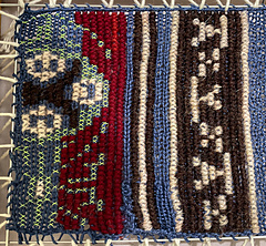  My "basting" stitches in bright green sewing thread, to designate all the stitches that would NOT be filled in with red. This took almost more time than everything else because I had to THINK and count chart squares.