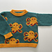 Age 6 (116cm). Duplicate stitch finish.