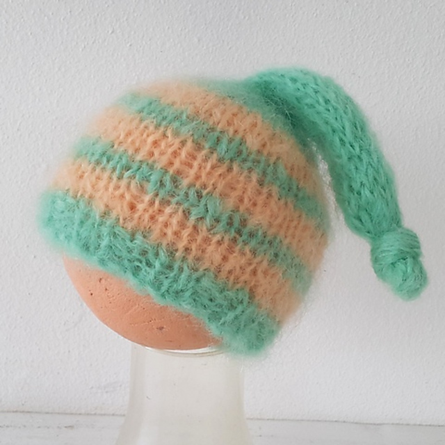 Ravelry Top Knot Baby Beanie pattern by Crafty Stuff Baby Knits