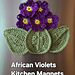 Crochet pattern for a bunch of African violets and leaves refrigerator magnets.