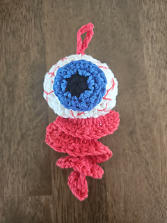Spooky Eyeball Spinner Crochet pattern for Halloween.