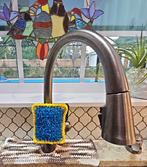 Hang it over the faucet to dry.