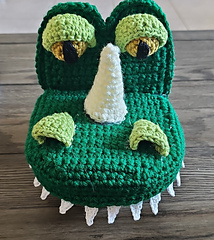 Dragon or leave off the horn and make it an Alligator