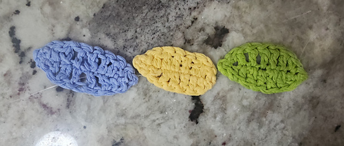 feathers back to back knotted on fishing line.