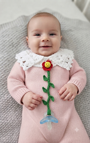 Lace baby collar with removable flower pacifier holder. Crochet pattern