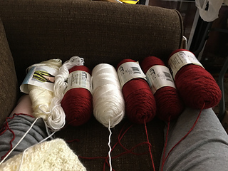 Many skeins of yarn attached at once