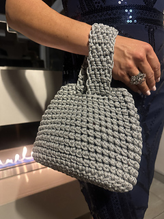A unique bag closure and strap.