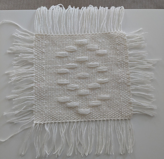 Quadruple weft floats and weft fringes