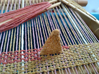 Needle-woven triangles