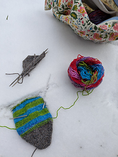 Toes of one sock and partial foot of the other sock.