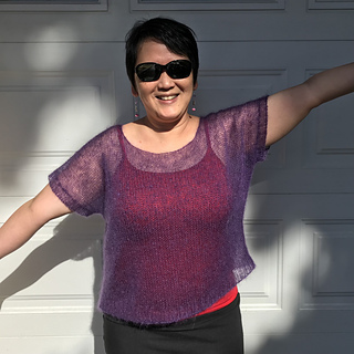 Size 4 - 11” of ease; knit 2” shorter than pattern 