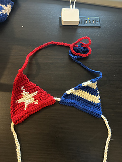 Flag bikini lies flat on a desk