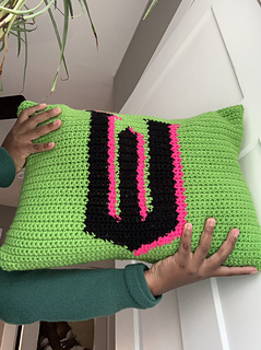 Sew two tapestries together and stuff with filling to make a pillow!