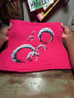 Tapestry lies on a desk